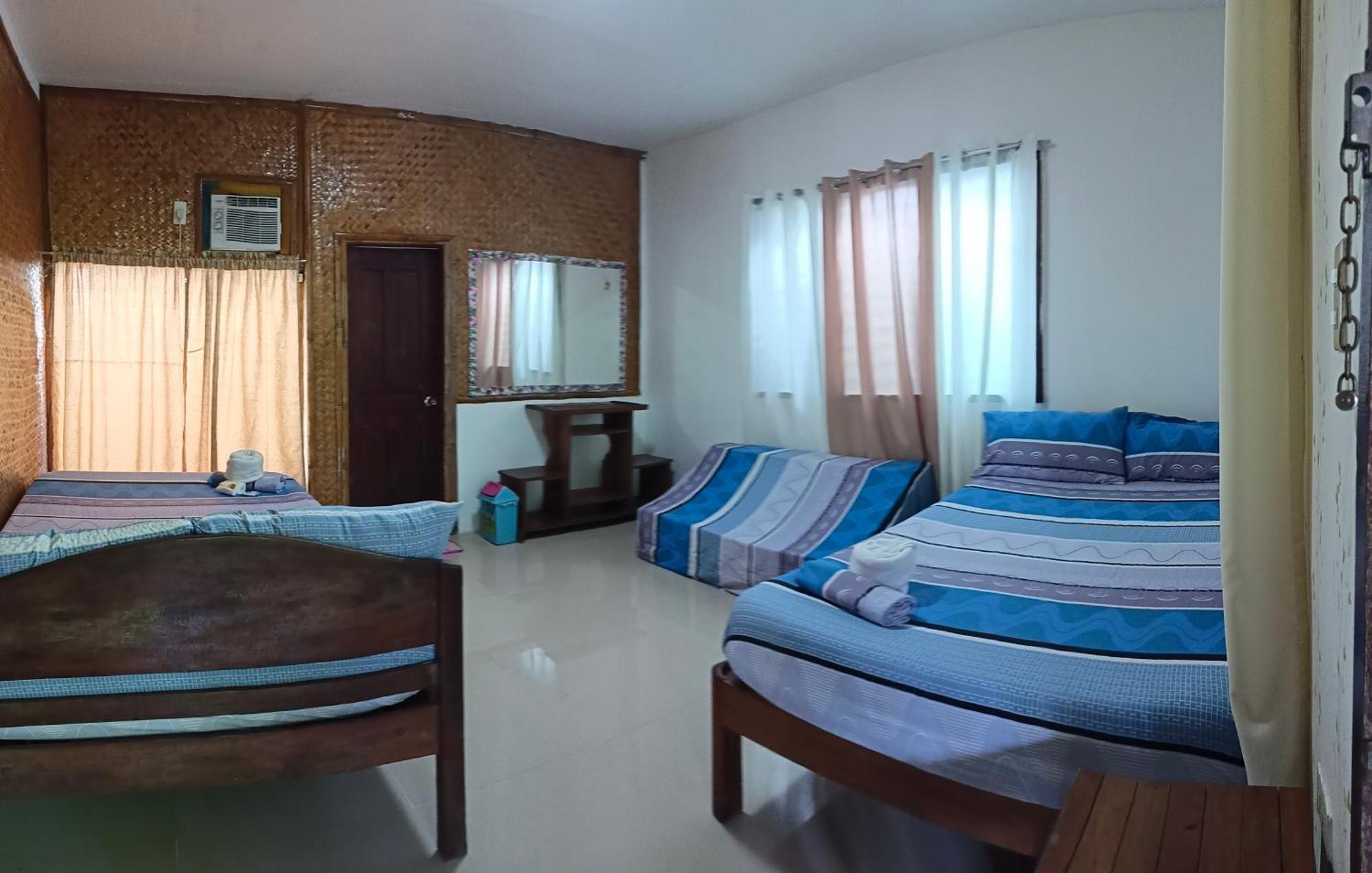 Victoria Guest House And Cottages Puerto Princesa Exterior photo